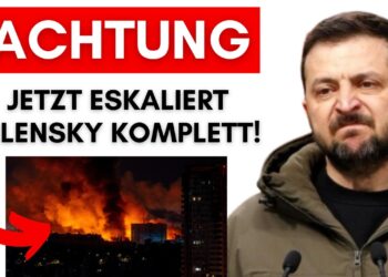 Schreckliche Feuerkatastrophe in Kiew, Ukraine, mit explodierenden Flammen und Rauchwolken, während Selenskyj auftritt; aktuelle Nachricht über eskalierte Situation.